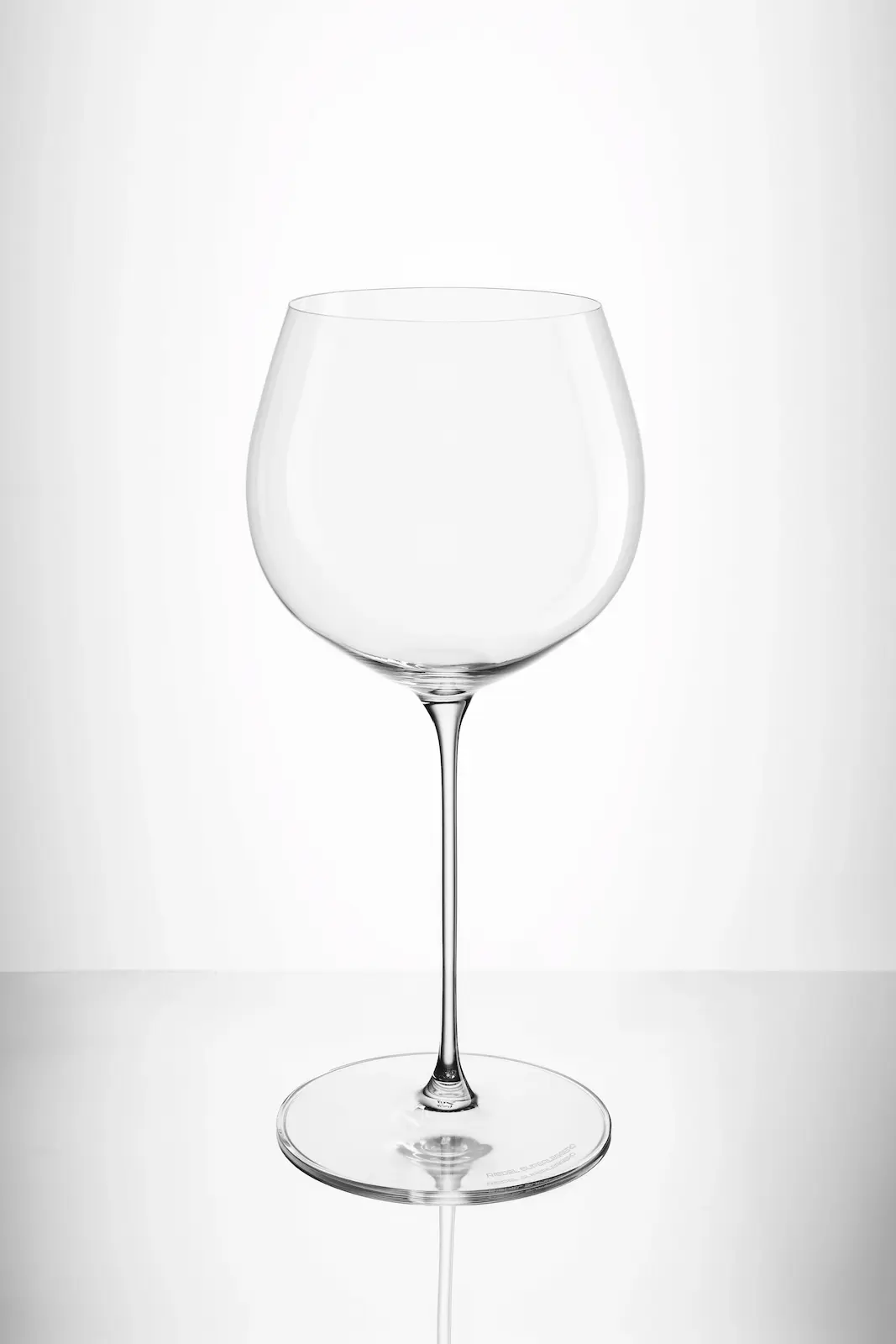 A wine glass on a white background